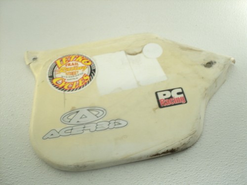 Cache latéral plastique - latéral, en